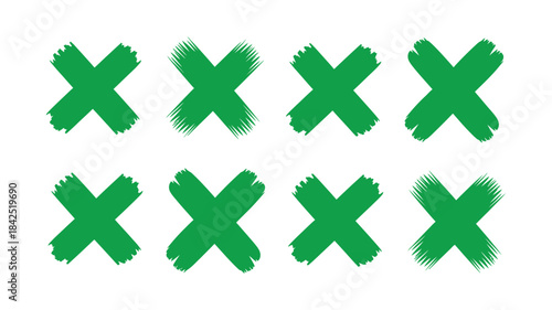 Eight green brush stroke x marks set as a pattern