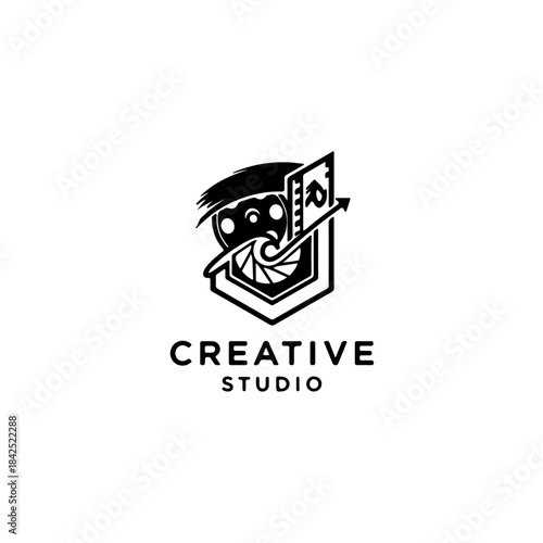 Creative studio logo design with camera aperture, playing card, and abstract face elements isolated on transparent background