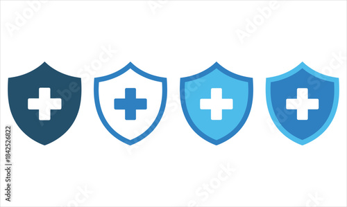 Four shield icons with a medical cross symbolizing health and protection in different shades