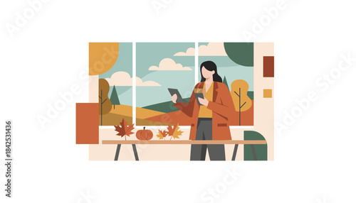 Professional woman working digitally by a window with fall decor and an autumn landscape view