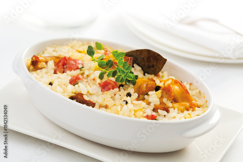 Baked rice with wild rabbit and black pepper.