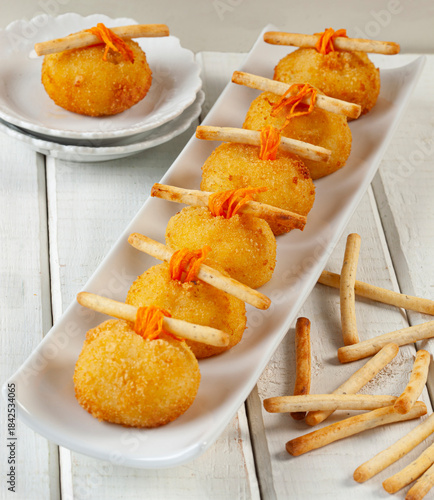 Cheese and carrot-stuffed fingers. Kids' food.