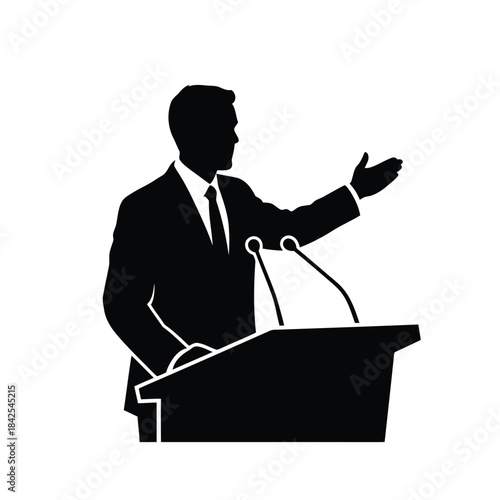 Silhouette of a professional man giving a presentation or public speech at a podium