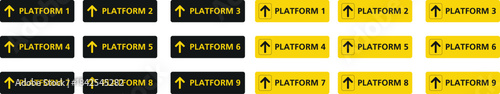 Set of Black and Yellow Train Station Platform Signs with Up Arrows and Numbers