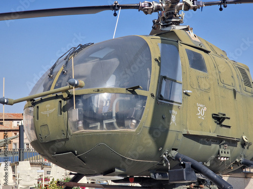 old military helicopter with its olive green color