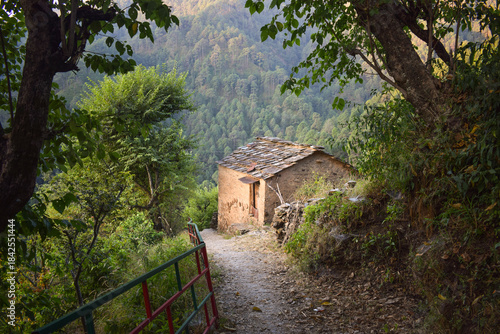 Mountain side village cow shed made of mud and stones.