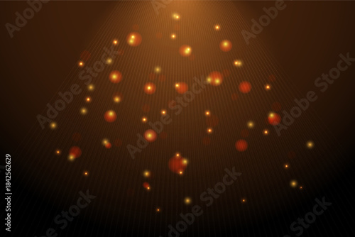 Soft golden and orange bokeh lights float against a dark backdrop, creating a warm, atmospheric abstract scene