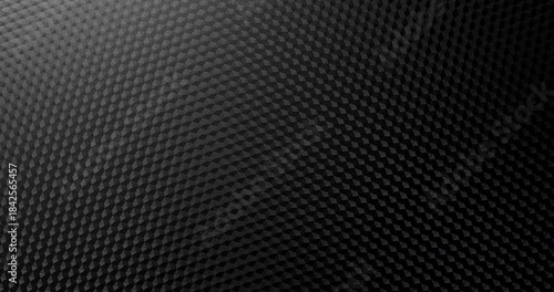 Carbon Texture. Close-up of premium black carbon fiber weave with subtle light shift, creating a high-tech, endlessly background.