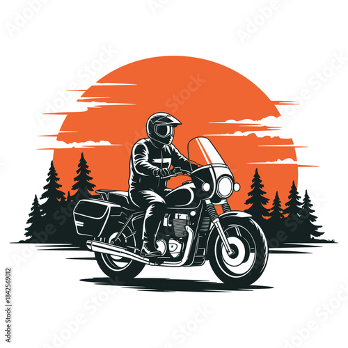 Vintage motorcycle rider silhouette against a beautiful orange sunset