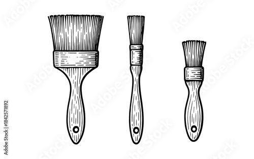 Vintage brush set with engraved wood handles for artistic projects