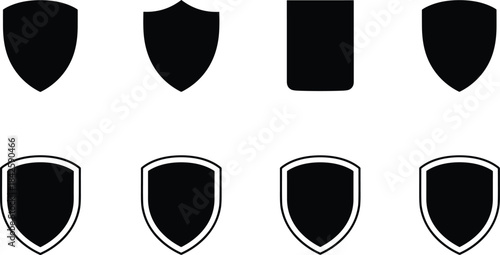 A set of eight bold black and white vector icons displaying different styles of security shields for representing protection, safety, guarantee, and defense in user interfaces.