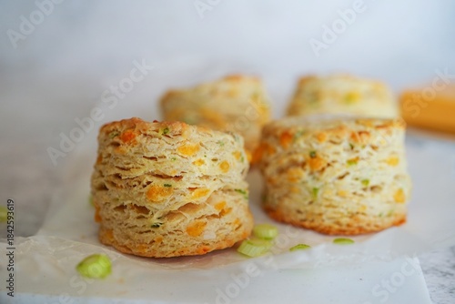 Homemade cheddar buttermilk biscuits with scallions, selective focus