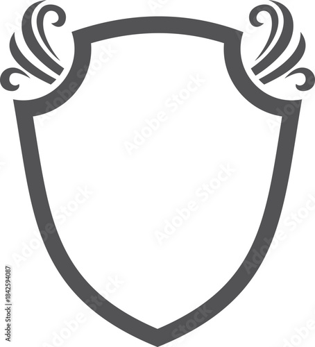 A black shield with a design of wings on it