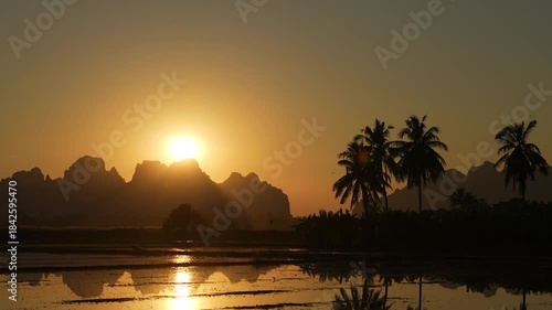 Time lapse with sunset over the mountain