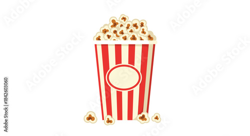 Classic red and white striped popcorn bucket filled to the brim, with a few kernels scattered at the bottom, ready for movie night.
