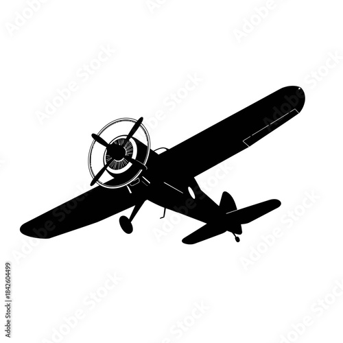 Silhouette of a vintage propeller airplane in flight.