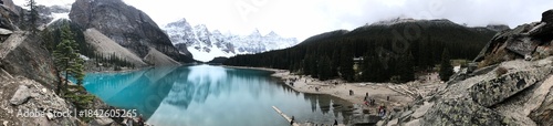 Panoramic landscape of Moraine Lake and Valley of the Ten Peaks in Banff National Park Alberta Canada featuring turquoise glacial water and snow capped mountains, Moraine Lake, Valley of the Ten Peaks