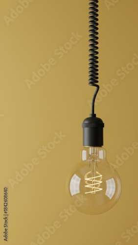 Illuminating Ideas - Transparent light bulb with filament hanging against mustard yellow background, concept of innovation and creativity with copy space