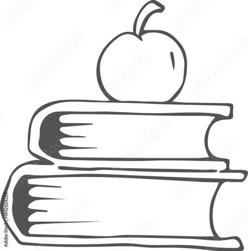 A book with an apple on top of it