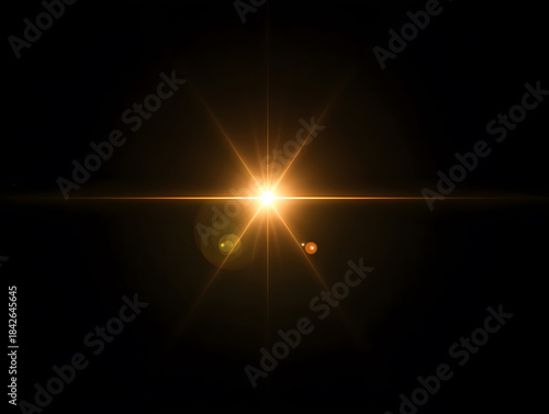 Golden Starburst Lens Flare on Black Background