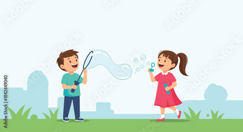 A happy boy and girl play together in a park on a sunny day, having fun blowing large and small soap bubbles into the air.
