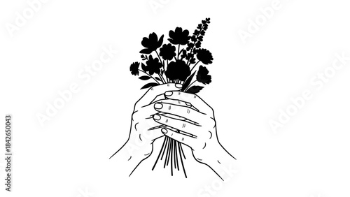 Two hands holding a bouquet of flowers with a delicate design  
