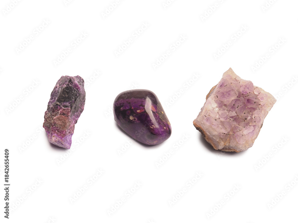 Fototapeta premium Three different amethysts on a transparent background