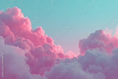 A vibrant image of puffy pink clouds contrasting against a light blue sky