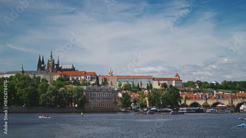 Prague Castle and St. Vitus Cathedral dominating Vltava river.