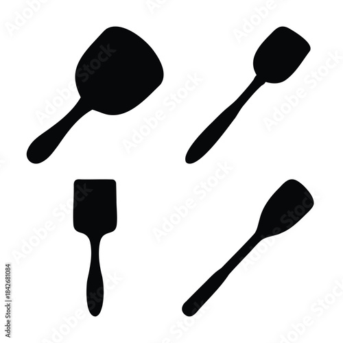 Kitchen cooking spatulas and turners set icon silhouette
