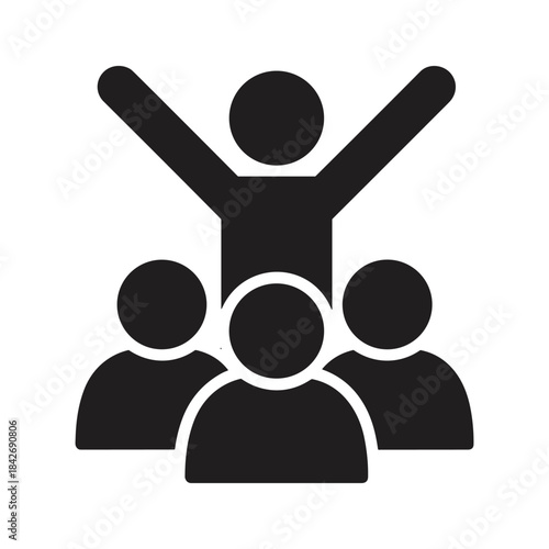 Leader standing on team members with arms raised