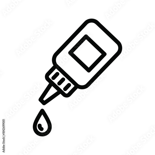 Bottle of liquid dropping a single drop