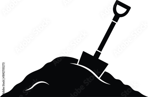 Black silhouette of shovel in dirt mound, angled handle, excavation concept, manual labor symbol, and gardening or construction design