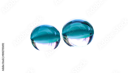 Two crystal-like spheres, vibrant turquoise, reflect light against a stark black background