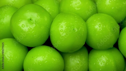 Close-up of Fresh Green Grapes with Water Droplets Spin slowly.