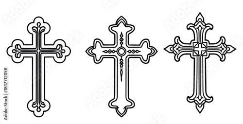 Collection of three ornate decorative Christian cross outlines perfect for religious design projects