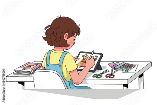 Young person sketching a dress design on a tablet at a workspace