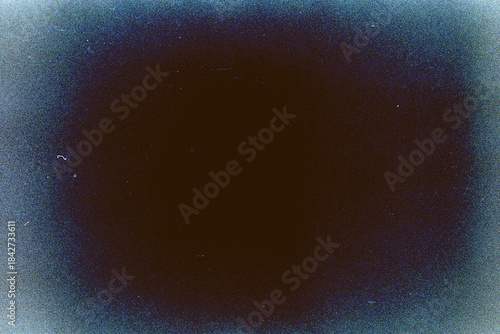 Blank grained film strip texture background with heavy grain, dust and light leak.