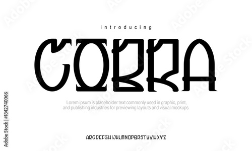 Cobra font is a A ferocious decorative display font inspired by wild beasts and snake forms, sharp curves and aggressive gothic energy.