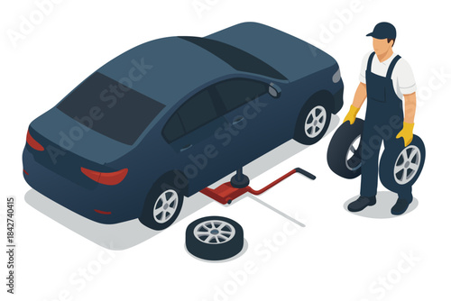 Mechanic changing car tire with professional tools