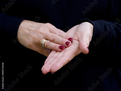Принти на полотні A pair of hands signing the consonant letter 'M' in British Sign Language