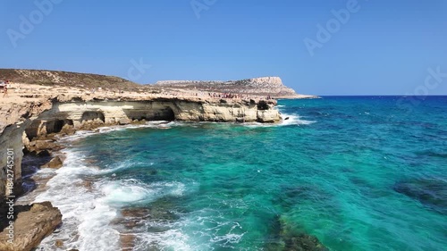 Sea Caves and Turquoise Water Along Rocky Coastline