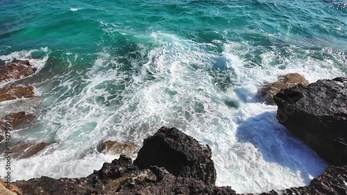 Sea Caves and Turquoise Water Along Rocky Coastline