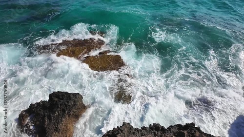 Sea Caves and Turquoise Water Along Rocky Coastline