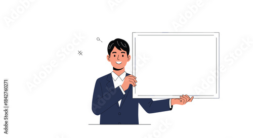 Smiling businessman in a dark suit happily holding a blank white board, ready for important text, announcements, or promotional messages.