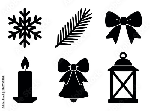 Silhouette collection of holiday symbols: snowflake, pine needle, bows, candle, bell, lantern