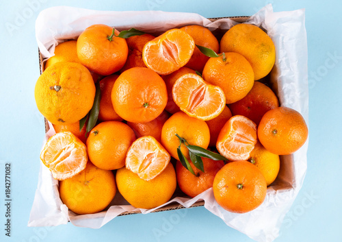 Wallpaper Mural Fresh tangerines, mandarin clementines, raw farm organic citrus fruits, with stems and leaves, for sale at market  Torontodigital.ca