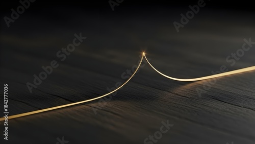 A single golden thread stretching across a dark, textured surface, gently lifting at one end as if pulled by an unseen hand; symbolic, clean, and powerful for themes of resilience, support, motivation