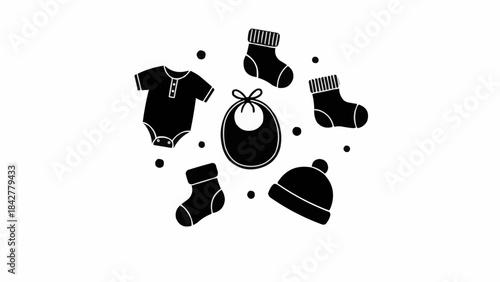 Collection of essential baby clothing and accessories for newborns.