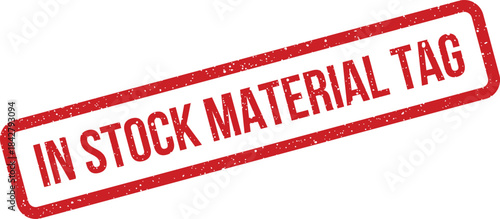 A distressed red rectangular rubber stamp showing IN STOCK MATERIAL TAG for raw goods and component supply chain tracking